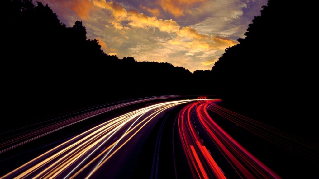 Fast-moving light trails symbolizing the rapid onset and overdose risk in fentanyl vs. morphine