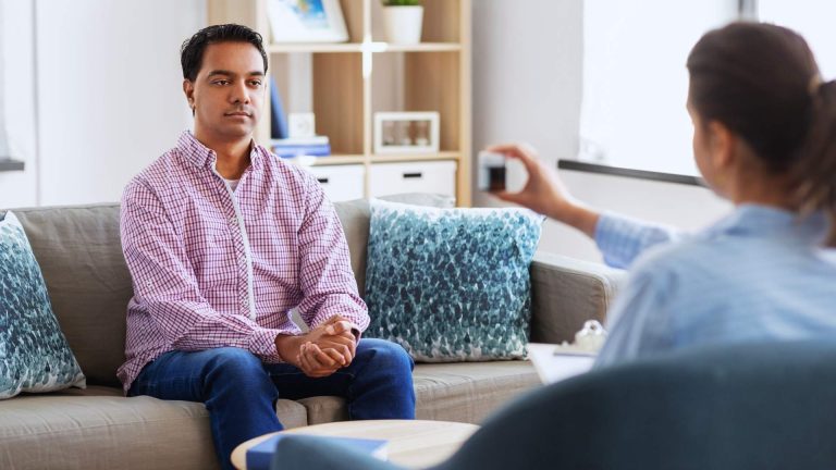 doctor shows medicine for heroin addiction