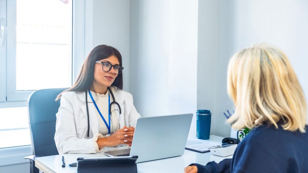 Healthcare provider discussing Vivitrol coverage and Medicaid eligibility with patient