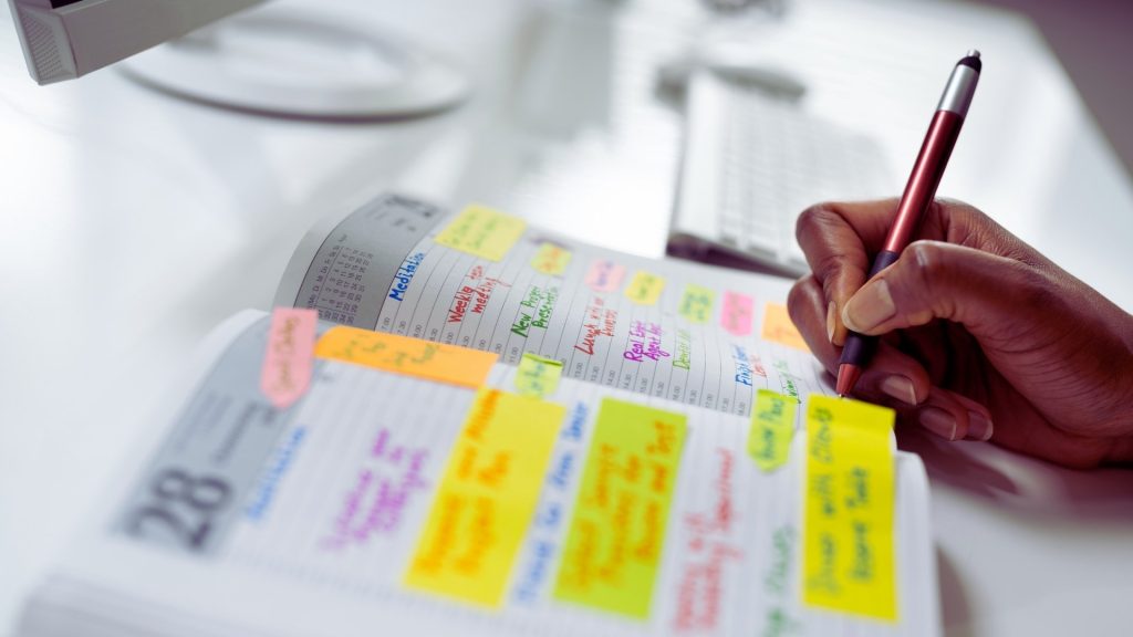 Color-coded planner showing a structured weekly schedule for work and appointments