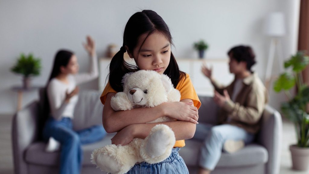 Addiction and Family: Understanding the Ripple Effects 1 Child upset while parents argue in addiction-affected family