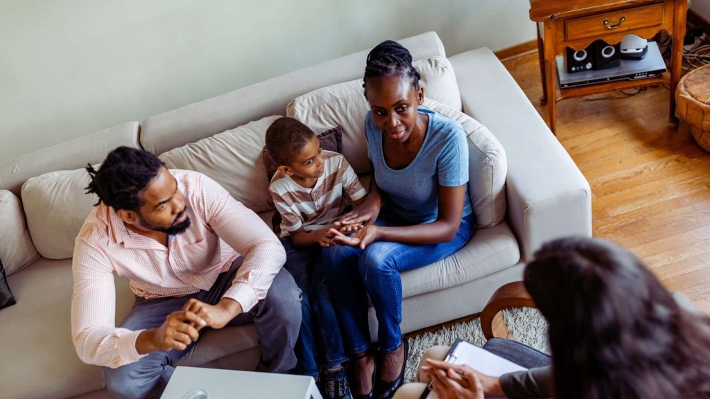 Addiction and Family: Understanding the Ripple Effects 4 Family participating in addiction treatment session together