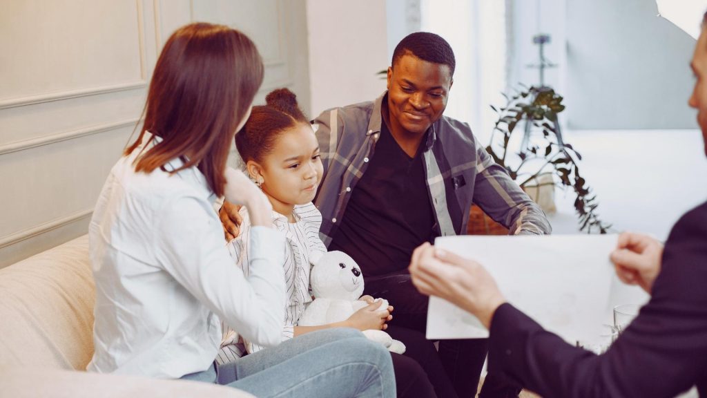 Family therapy for addiction session helping parents and child rebuild communication