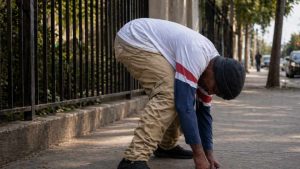 The Fentanyl Fold What Actually Is It hero image of man folded over due to fentanyl use.