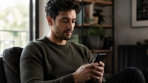 can you overdose on cocaine hero image of a man looking up the answer on his phone.