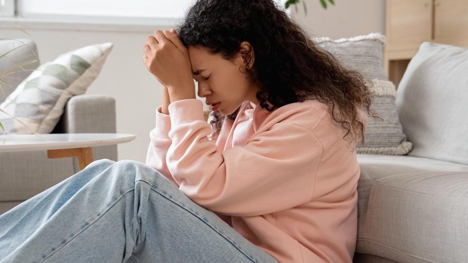 How to Stop a Panic Attack hero image of a person experiencing a panic attack.
