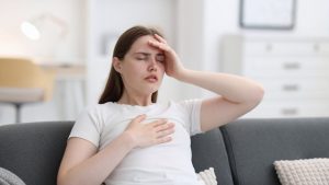 Hypomania vs. Mania hero image of a woman experiencing an episode.